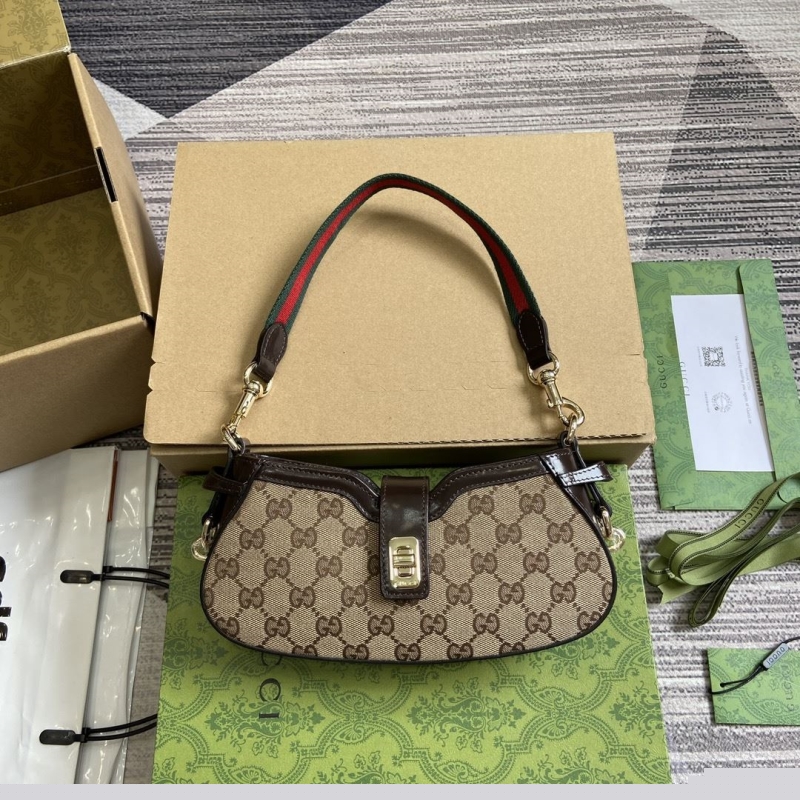 G*u*i top handle bags